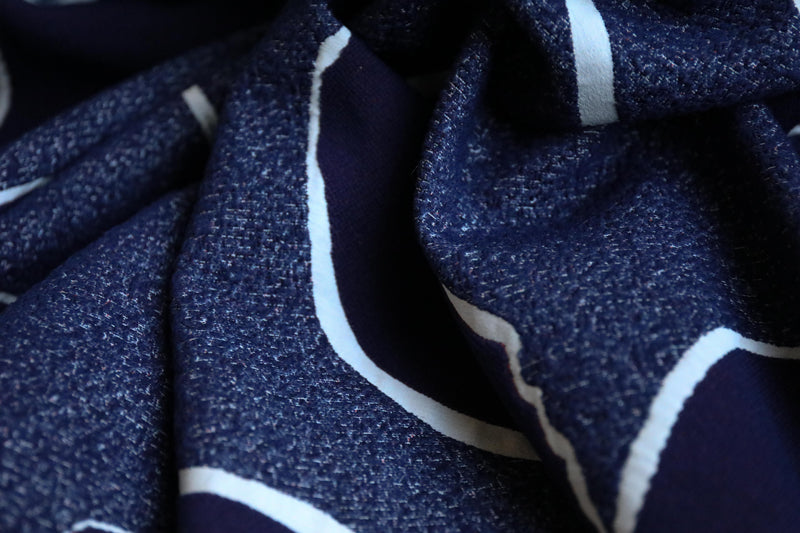 Face on navy jacquard light coating