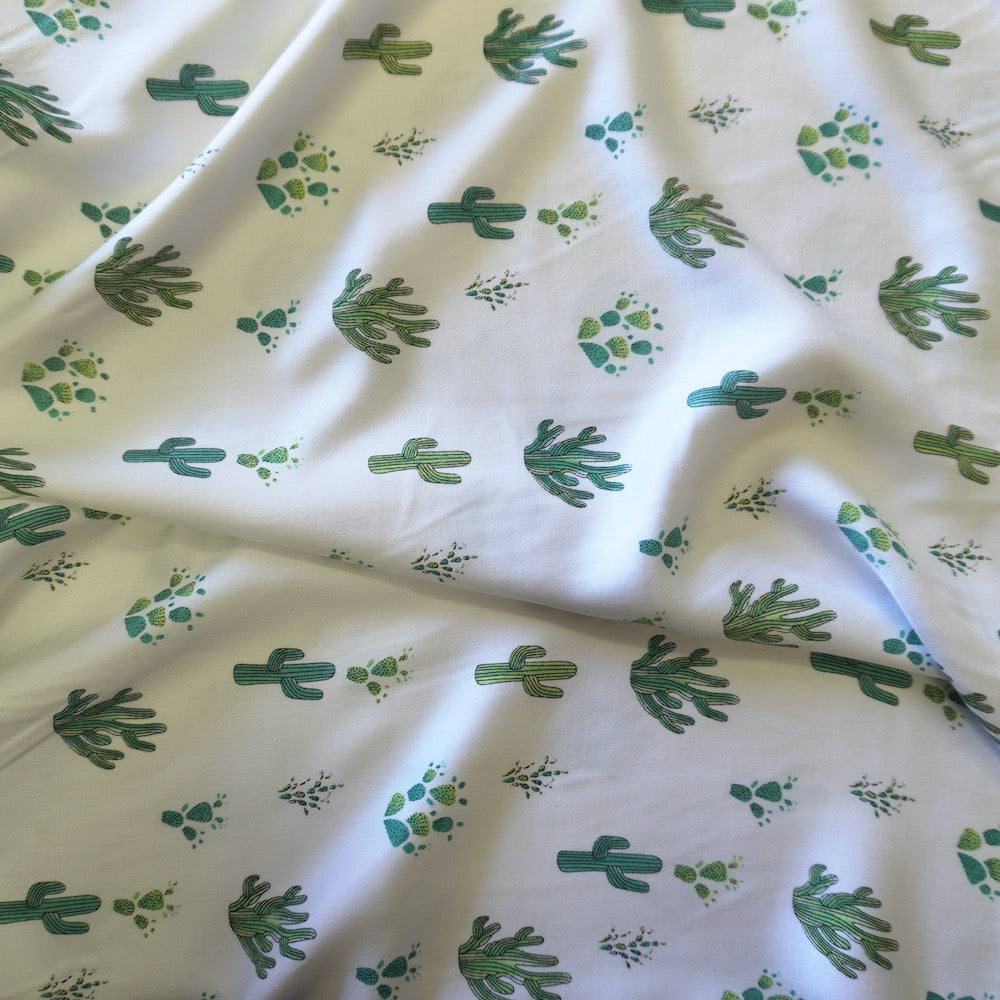 Cactus print on off white viscose fabric