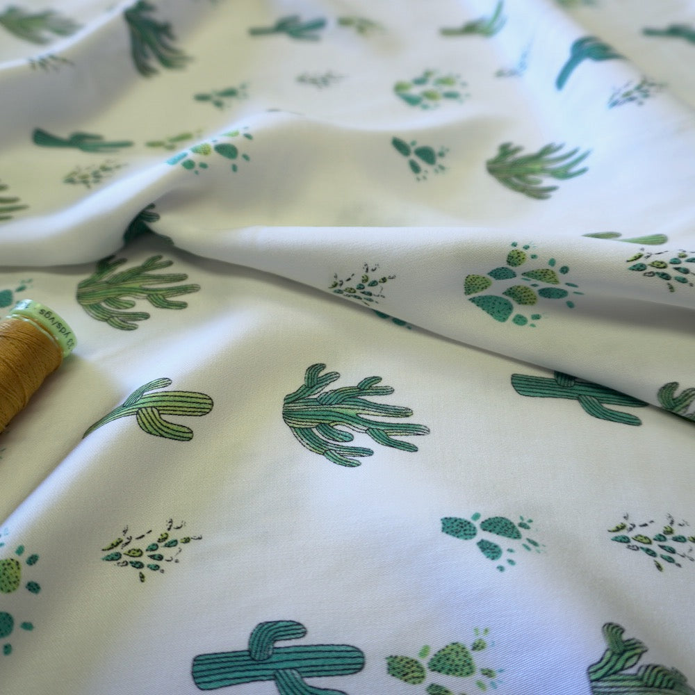 Cactus print on off white viscose fabric