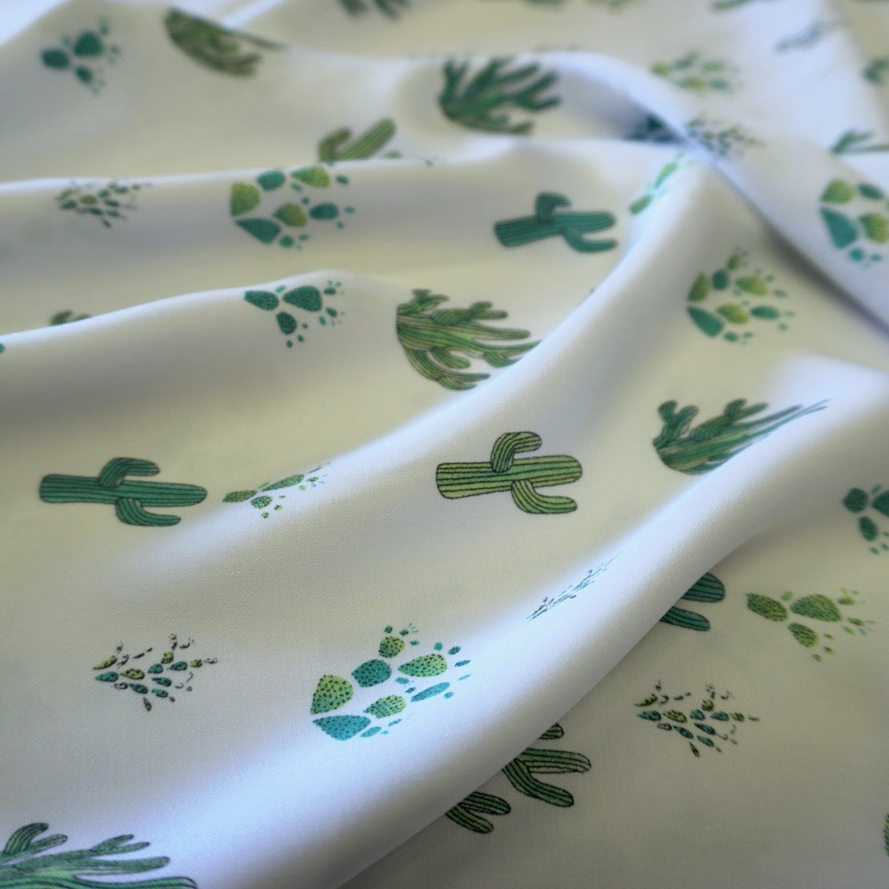 Cactus print on off white viscose fabric