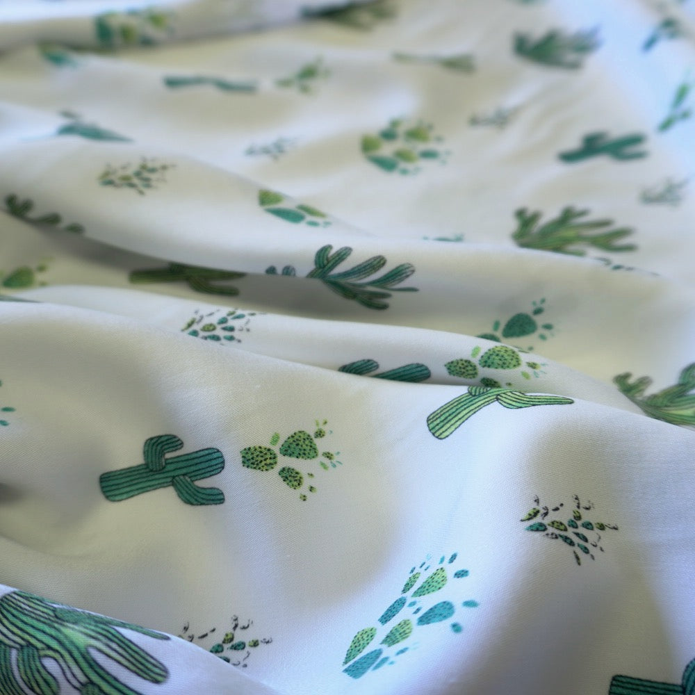 Cactus print on off white viscose fabric