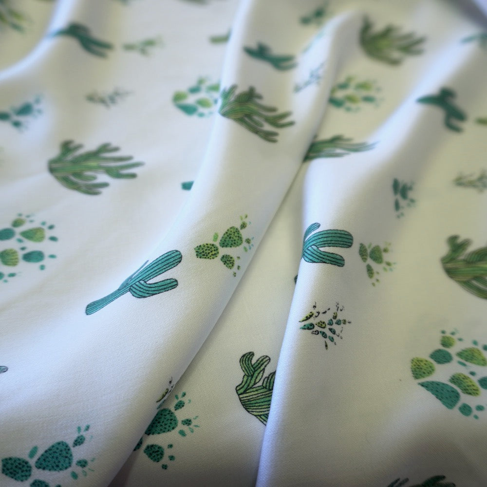Cactus print on off white viscose fabric