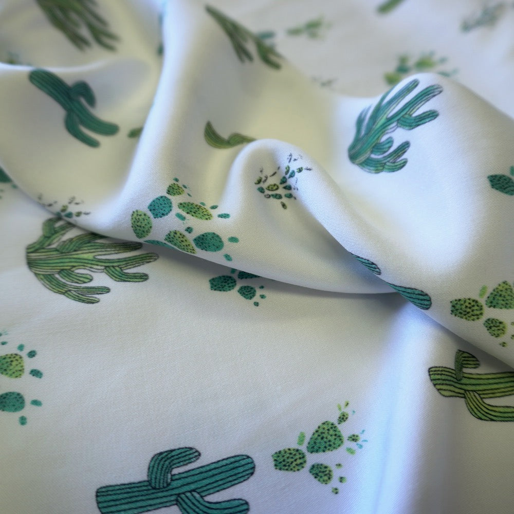 Cactus print on off white viscose fabric