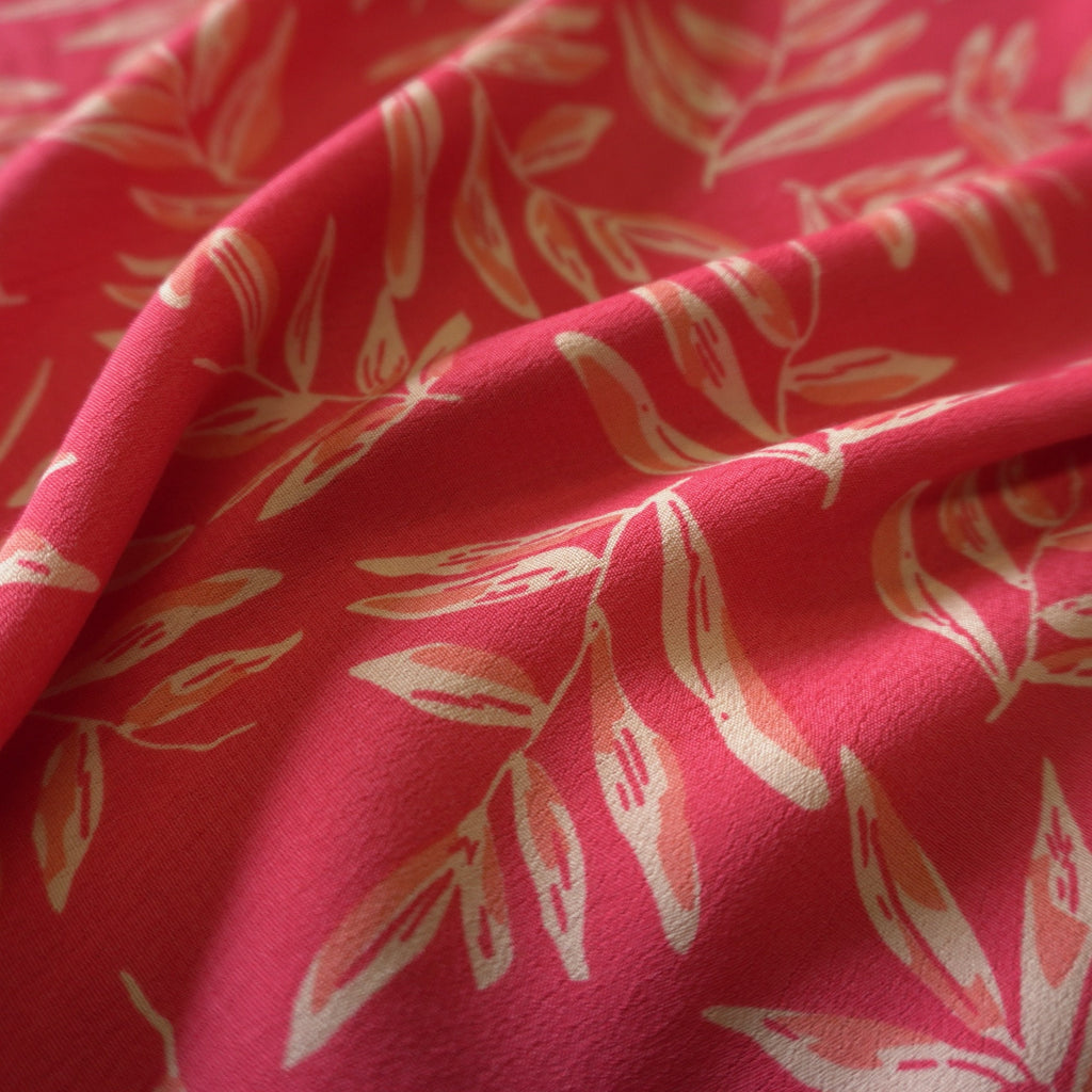 Viscose Dual Crepe Fabric - Leaves On Pink Red