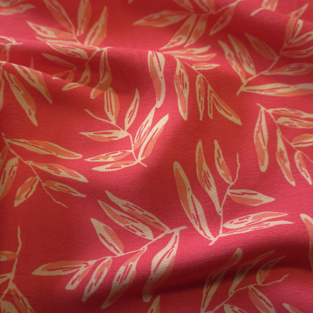 Viscose Dual Crepe Fabric - Leaves On Pink Red