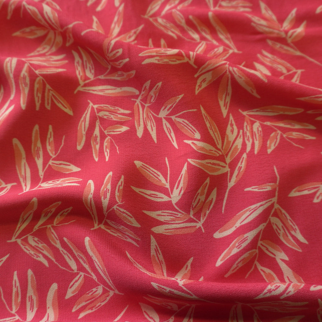 Viscose Dual Crepe Fabric - Leaves On Pink Red