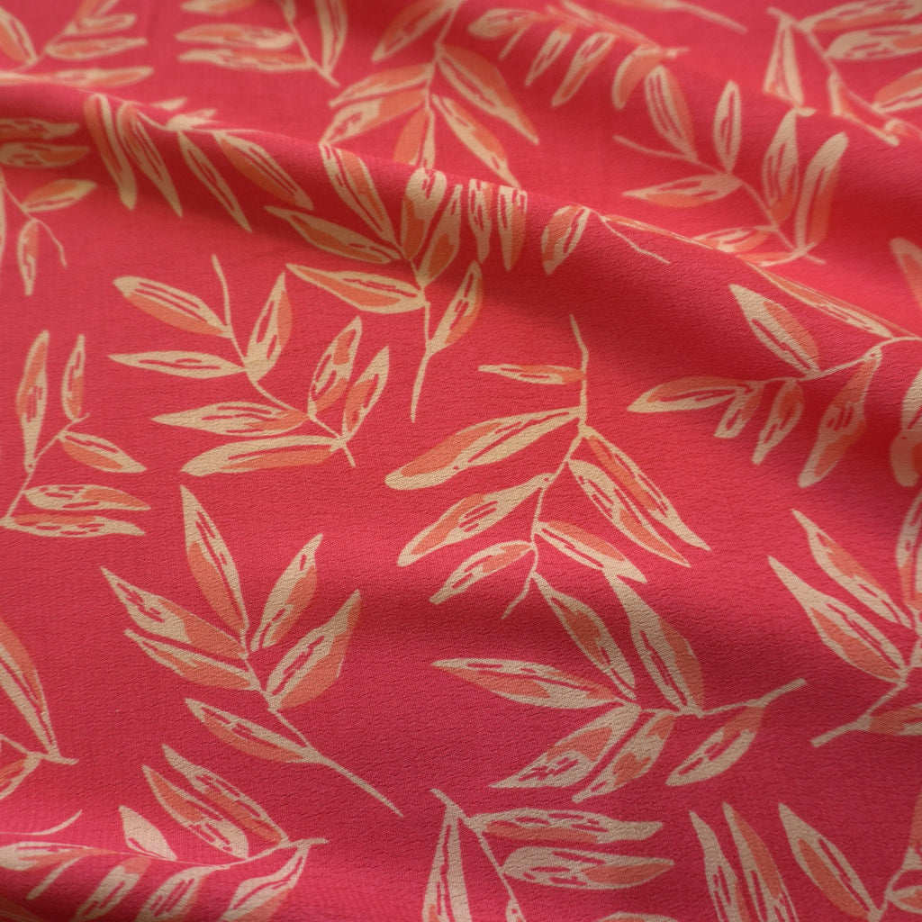 Viscose Dual Crepe Fabric - Leaves On Pink Red