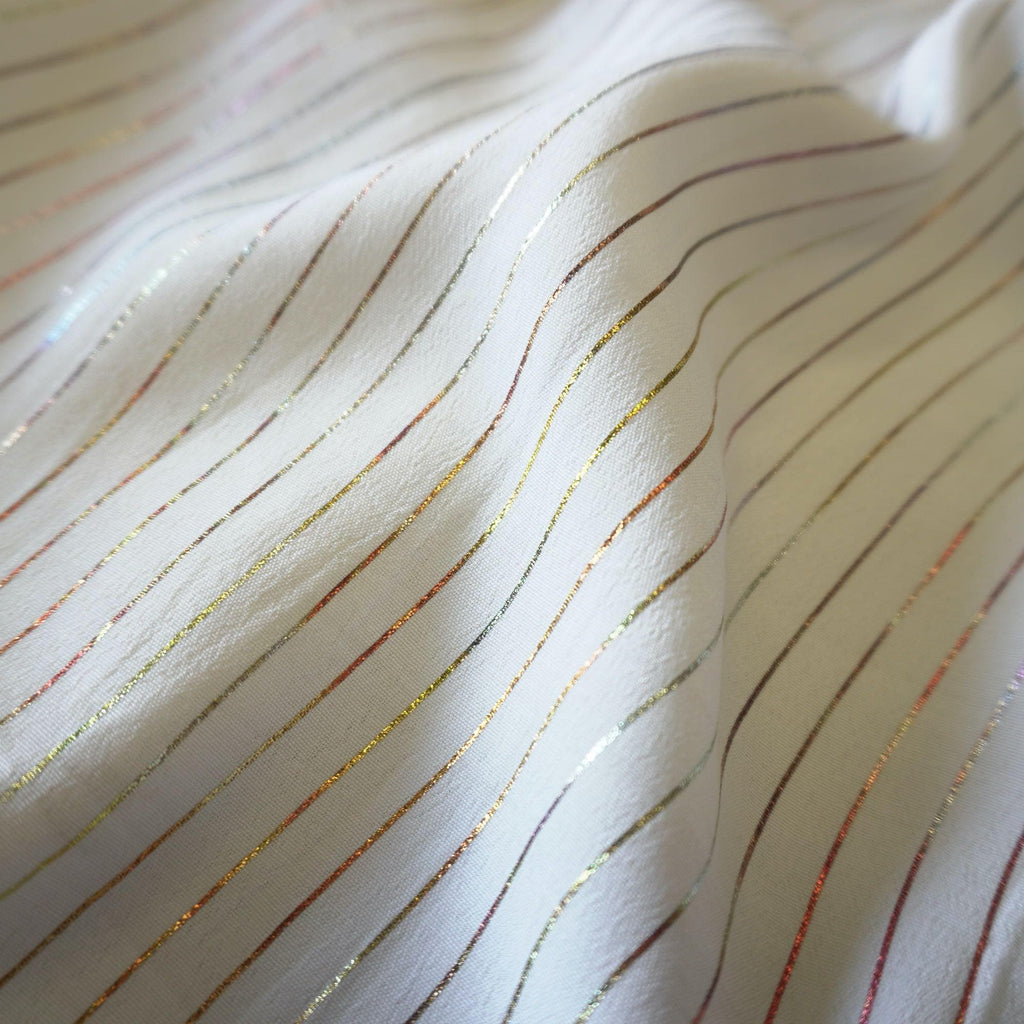 Metallic pin stripe viscose crepe fabric