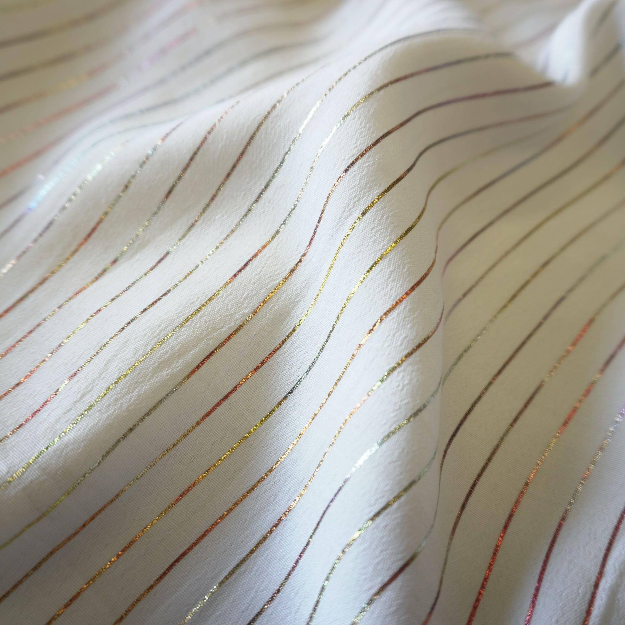 Metallic pin stripe viscose crepe fabric