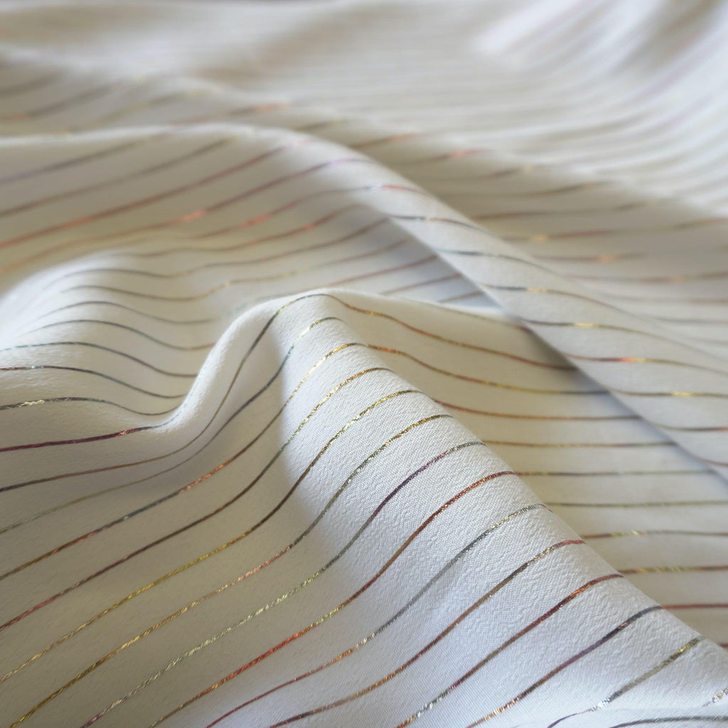 Metallic pin stripe viscose crepe fabric