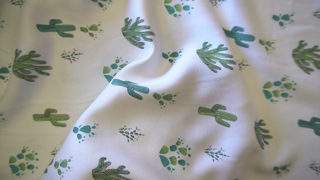 Cactus print on off white viscose fabric
