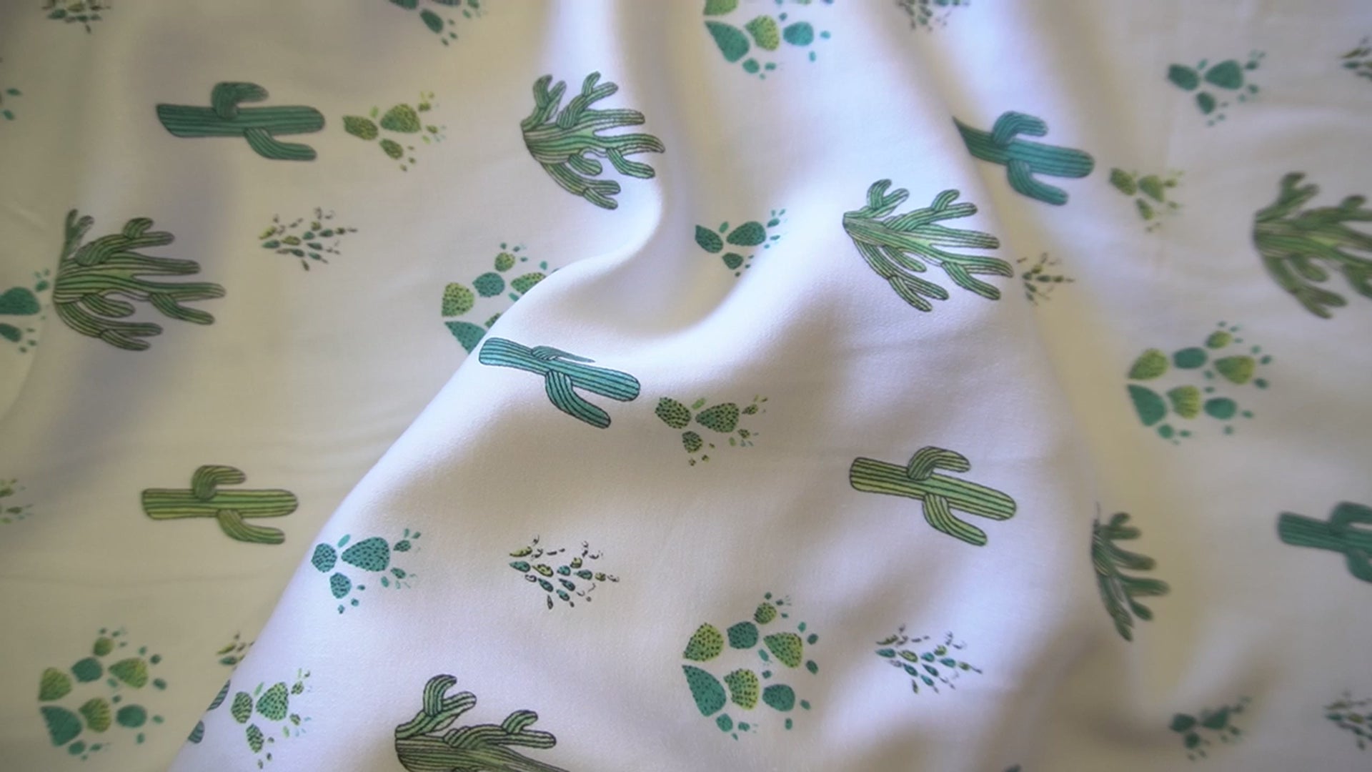 Cactus print on off white viscose fabric
