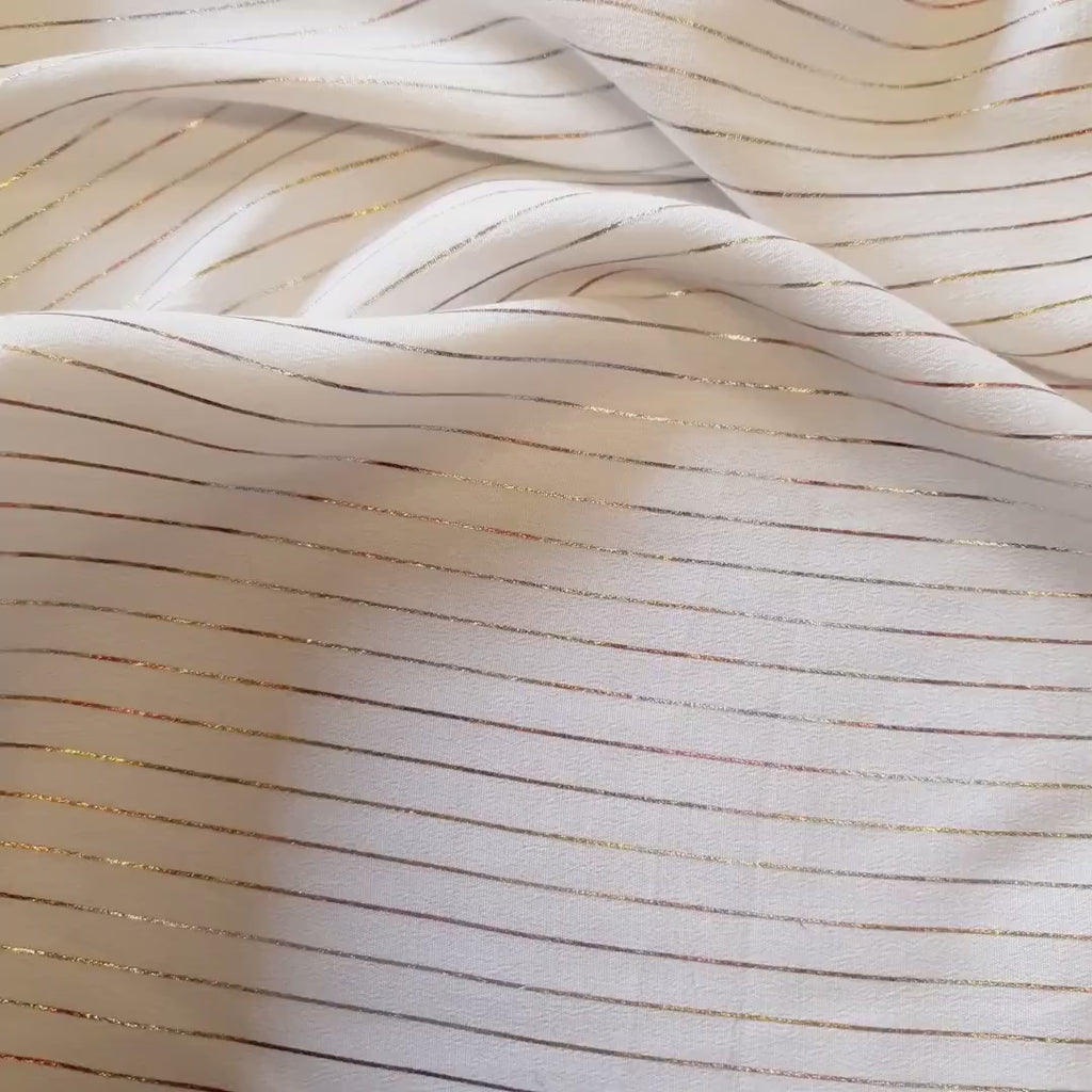 Metallic pin stripe viscose crepe fabric